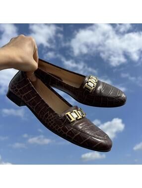 Italian crocodile pattern leather loafers with mixed metal, low heel.